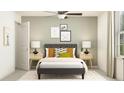 Inviting bedroom with sage walls, and neutral decor at 8445 Sea Ray Run, Parrish, FL 34219