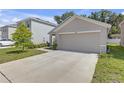 Charming one-story home with a neutral paint scheme and a two-car garage at 36628 Spanish Rose Dr, Dade City, FL 33525