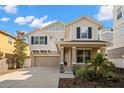 Charming two-story home with a welcoming front porch and well-maintained lawn at 1520 W Fig St, Tampa, FL 33606