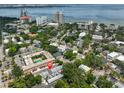 Aerial view of neighborhood and townhouse location in beautiful beachside community with skyline and ocean view at 2011 S Carolina Ave, Tampa, FL 33629
