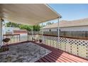 Inviting covered back deck with decorative railing, providing a relaxing outdoor living space at 6036 110Th N Ave, Pinellas Park, FL 33782