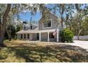Gorgeous home with an American flag waving in the breeze at 11207 Donneymoor Dr, Riverview, FL 33569