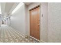 Condo hallway leading to a door numbered 3009 at 777 N Ashley Dr # 3009, Tampa, FL 33602