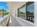 Exterior balcony view showing the architecture and outdoor space available with the unit at 2461 Rhodesian Dr # 37, Clearwater, FL 33763