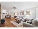 Comfortable living room area, adjacent to the dining area, offering a bright space for entertaining at 2461 Rhodesian Dr # 37, Clearwater, FL 33763