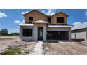 Unfinished two-story home with block construction and a two-car garage is ready for your personal touch at 10652 Crescent Creek Xing, Parrish, FL 34219