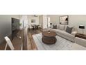 Cozy living room and dining area featuring stylish furniture, hardwood floors, and a contemporary design at 2002 Australia E Way # 66, Clearwater, FL 33763