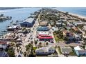 Pass-a-Grille marina with waterfront buildings and a scenic view from above the charming coastal community at 2100 Pass A Grille Way, St Pete Beach, FL 33706