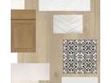 Display of interior finishes including cabinets, flooring, tile and countertops for a modern home at 3108 W Varn Ave, Tampa, FL 33611