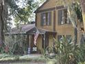 A charming two-story home with a well-maintained landscape and an inviting front porch at 314 Bloomingfield Dr, Brandon, FL 33511