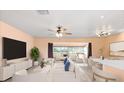 Spacious living area filled with natural light, with ample room for dining at 5108 Commonwealth Rd, Palmetto, FL 34221