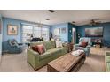 Bright living room featuring comfortable seating and natural light at 5623 80Th N St # 504, St Petersburg, FL 33709