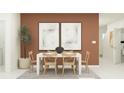 Stylish dining room featuring white table, four chairs, rustic wall color, and natural light at 5627 Red Kite Dr, Wimauma, FL 33598