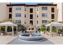 Condo courtyard with fountain and seating area at 200 4Th S Ave # 220, St Petersburg, FL 33701