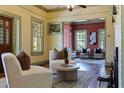 Cozy living room featuring hardwood floors, plush seating, and charming decorative accents at 202 39Th S Ave, St Petersburg, FL 33705