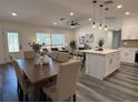 Open-concept living and dining area featuring modern decor and ample natural light at 2254 66Th S Ave, St Petersburg, FL 33712