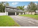 Attractive two-story home with a long driveway and a well-maintained front yard at 226 Willowick Ave, Temple Terrace, FL 33617