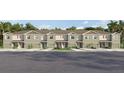 Newly constructed townhomes featuring individual garages, manicured lawns, and neutral two-tone color schemes at 3637 Copper Beech Dr, Land O Lakes, FL 34638