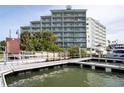 Condo building and boat slips with multiple balconies and water views at 399 2Nd St # 417, Indian Rocks Beach, FL 33785