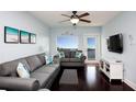 Cozy living room with contemporary furnishings and view of the river at 399 2Nd St # 417, Indian Rocks Beach, FL 33785