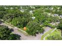A corner lot with mature trees offering privacy and shade for the home and surrounding neighborhood at 5901 3Rd S St, St Petersburg, FL 33705