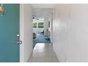 Inviting foyer with view of living area beyond at 801 83Rd N Ave # 209, St Petersburg, FL 33702
