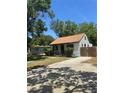 Classic single-story home with a traditional design and private driveway at 1675 13Th S Ave, St Petersburg, FL 33712