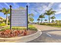 Informative community signage showcasing the various amenities and attractions at Little Harbor with meticulous landscaping at 3282 Mangrove Point Dr, Ruskin, FL 33570