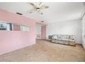 This spacious living room offers tiled floors and versatile design options at 3348 Clydesdale Dr, Holiday, FL 34691