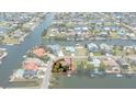 Aerial view showcasing the waterfront property location, canal access, and community layout at 4315 Flexer Dr, Hernando Beach, FL 34607