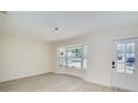 Living room featuring a bright bay window that floods the room with natural light at 4700 Chancellor Ne St, St Petersburg, FL 33703