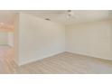 Bright, airy living space showcasing modern flooring and fresh neutral paint tones at 4700 Chancellor Ne St, St Petersburg, FL 33703