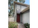 Attractive townhome with a lovely front door and covered entry at 6206 Dewdrop Way # 0, Temple Terrace, FL 33617
