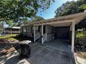 Cozy single-story home with a covered carport in a quiet neighborhood at 9025 1St Ne St, St Petersburg, FL 33702
