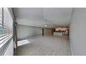 Spacious living area featuring an open concept with tile floors and neutral paint at 1881 Colding Dr, Ruskin, FL 33570
