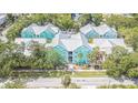 Charming condo community features mature landscaping and well-maintained buildings at 3002 W Cleveland St # C3, Tampa, FL 33609
