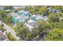 Well-maintained condo community features mature landscaping at 3002 W Cleveland St # C3, Tampa, FL 33609