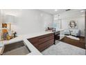Modern kitchen with stainless steel appliances, white countertops, and stylish hexagonal tile flooring at 4019 W Bay To Bay Blvd, Tampa, FL 33629