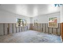Spacious living area featuring an abundance of natural light with multiple windows at 417 66Th S Ave, St Petersburg, FL 33705