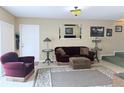 Inviting living room featuring a cozy seating area and neutral decor at 11764 Raintree Dr # 0, Temple Terrace, FL 33617