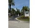 Welcoming gated community entrance with manicured landscaping and signage at 12631 Silverdale St, Tampa, FL 33626