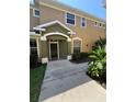 Inviting front entrance with a covered porch and well-maintained landscaping at 12631 Silverdale St, Tampa, FL 33626