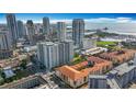 An aerial view of luxury condos in a vibrant urban neighborhood, near the ocean and marina at 200 4Th S Ave # 229, St Petersburg, FL 33701