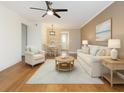 Nicely decorated living room with stylish furniture, hardwood floors, and cozy ambiance at 6015 19Th N St # 311, St Petersburg, FL 33714