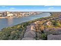 Waterfront condos feature serene water views, lush greenery, and convenient access to nearby industry at 716 Promenade Pl, Tampa, FL 33602