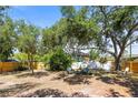 Spacious backyard perfect for outdoor relaxation and entertaining at 1516 Santa Anna Dr, Dunedin, FL 34698