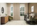 Bedroom design featuring a crib, comfortable chair, and dresser for a serene atmosphere at 18136 Serene Lake Loop, Lutz, FL 33548