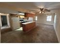 View of the living room connected to the kitchen at 11198 58Th Ave, Seminole, FL 33772