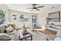 Cozy living room with a serene ambiance and plenty of natural light at 1750 Dayton S St, St Petersburg, FL 33712