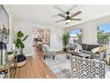 Bright and airy living room featuring stylish decor and hardwood flooring at 1750 Dayton S St, St Petersburg, FL 33712
